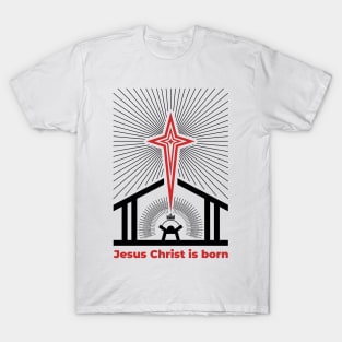 Baby Jesus in the barn, from above the light of the star of Bethlehem. Nativity of the Savior Christ. T-Shirt